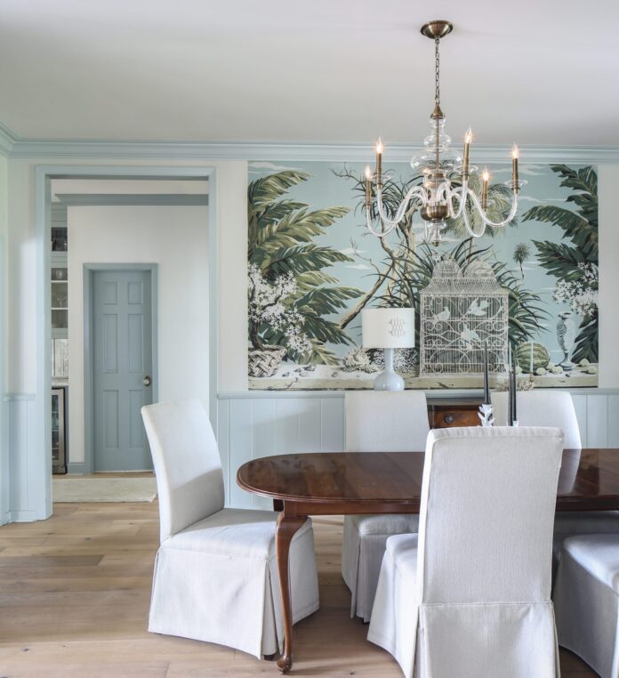 An original 1950s Palm Beach-style mural serves as inspiration for the history-minded renovation of an Old Goodwood home